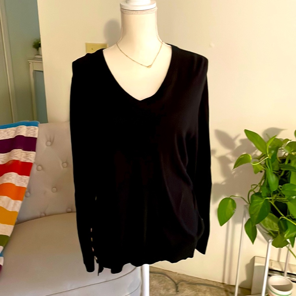 Joan Vass in black